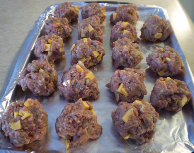 Meatloaf formed into meatballs.