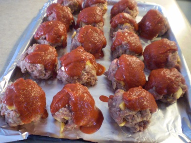 Meatloaf meatballs with homemade ketchup style sauce.
